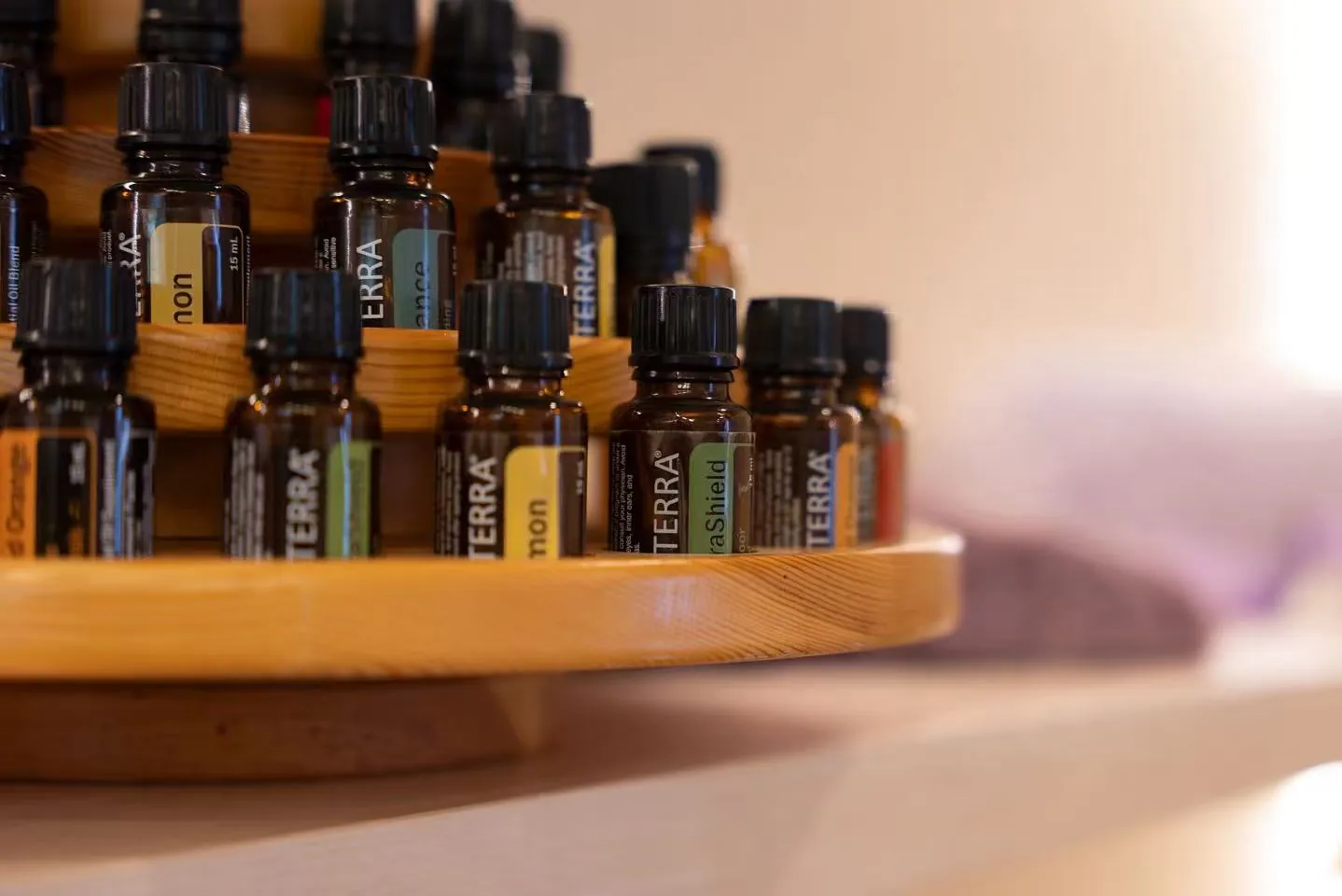 Warm towels, oils and a dressed treatment table prepared for a signature spa package at TAO in Vienna, VA